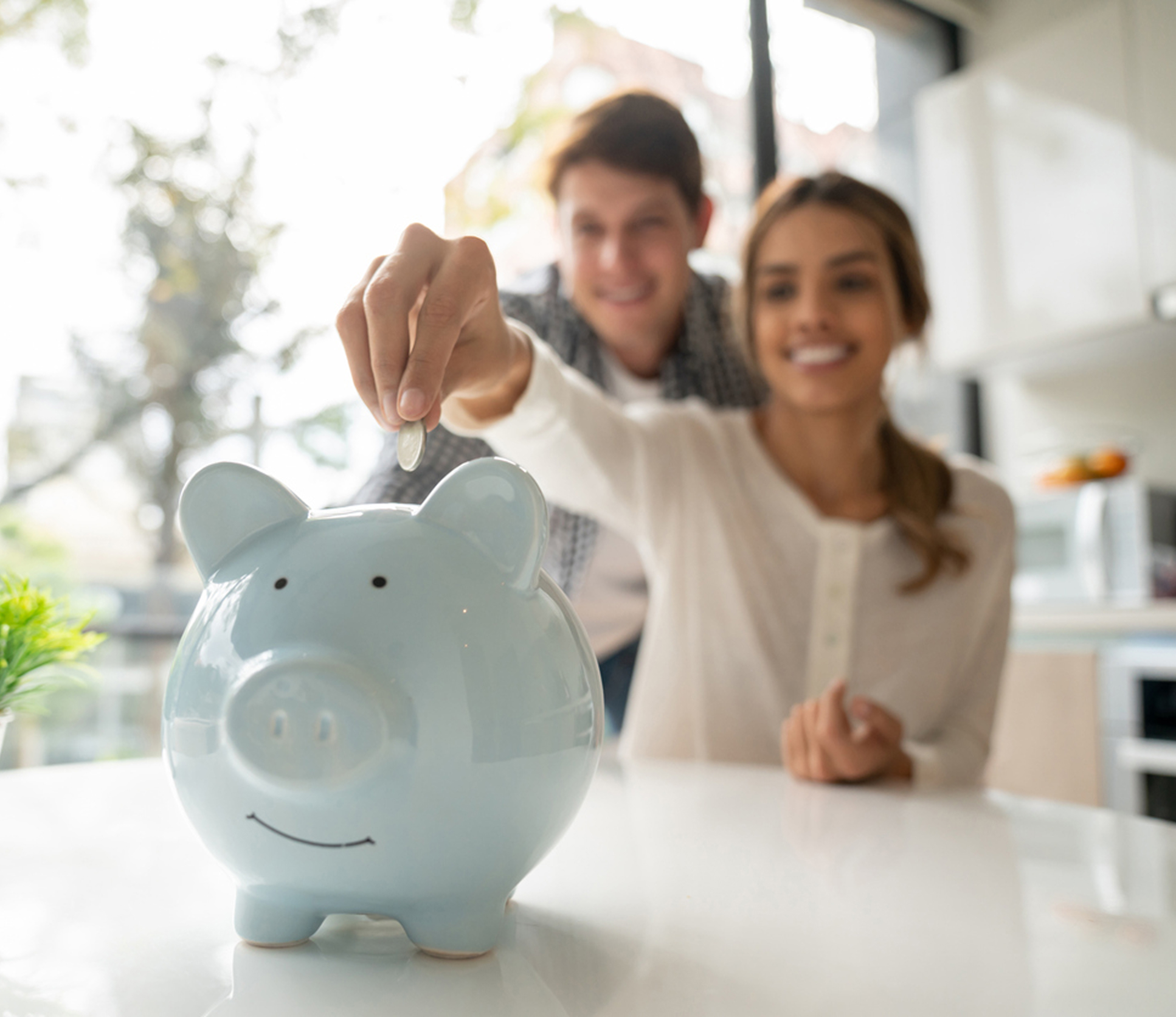 Couple with piggy bank